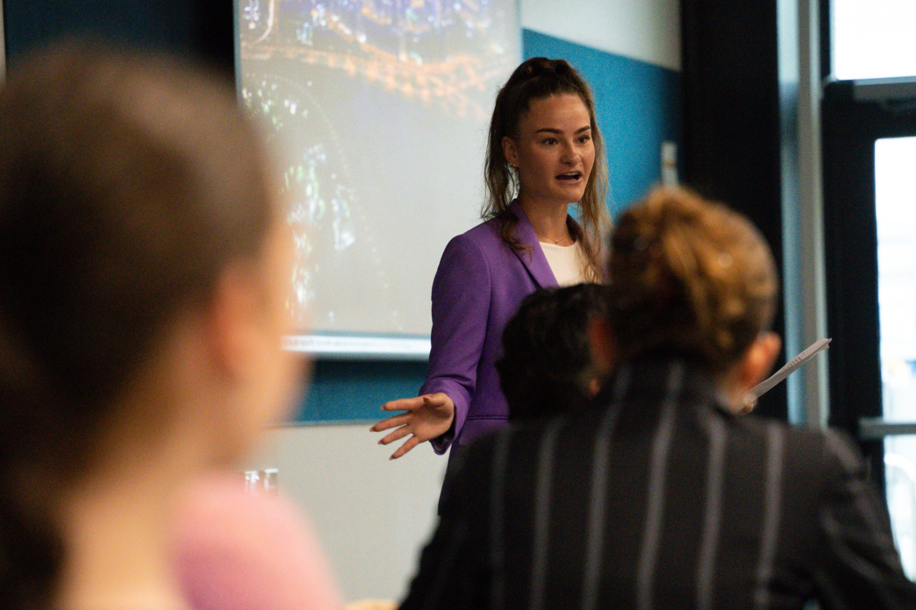 Rebecca Furness speaking on stage